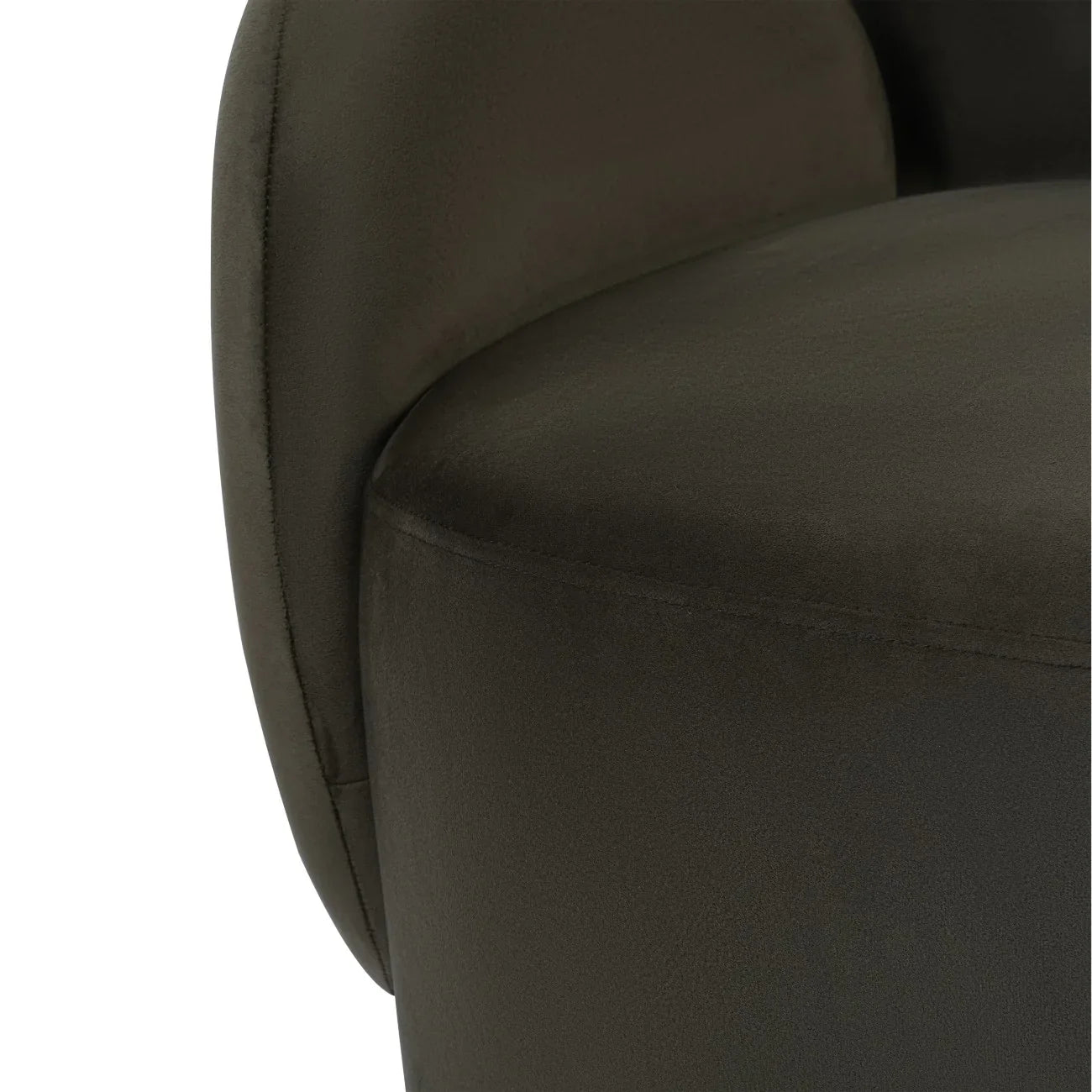 Dark green velvet chair showing smooth upholstery detail.