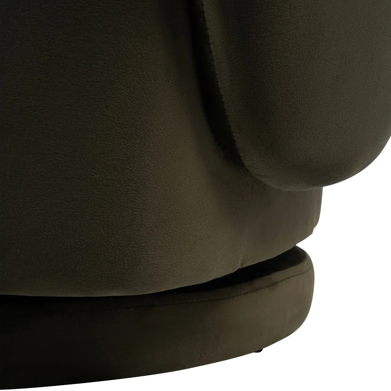 Dark green velvet chair base with smooth texture detail.