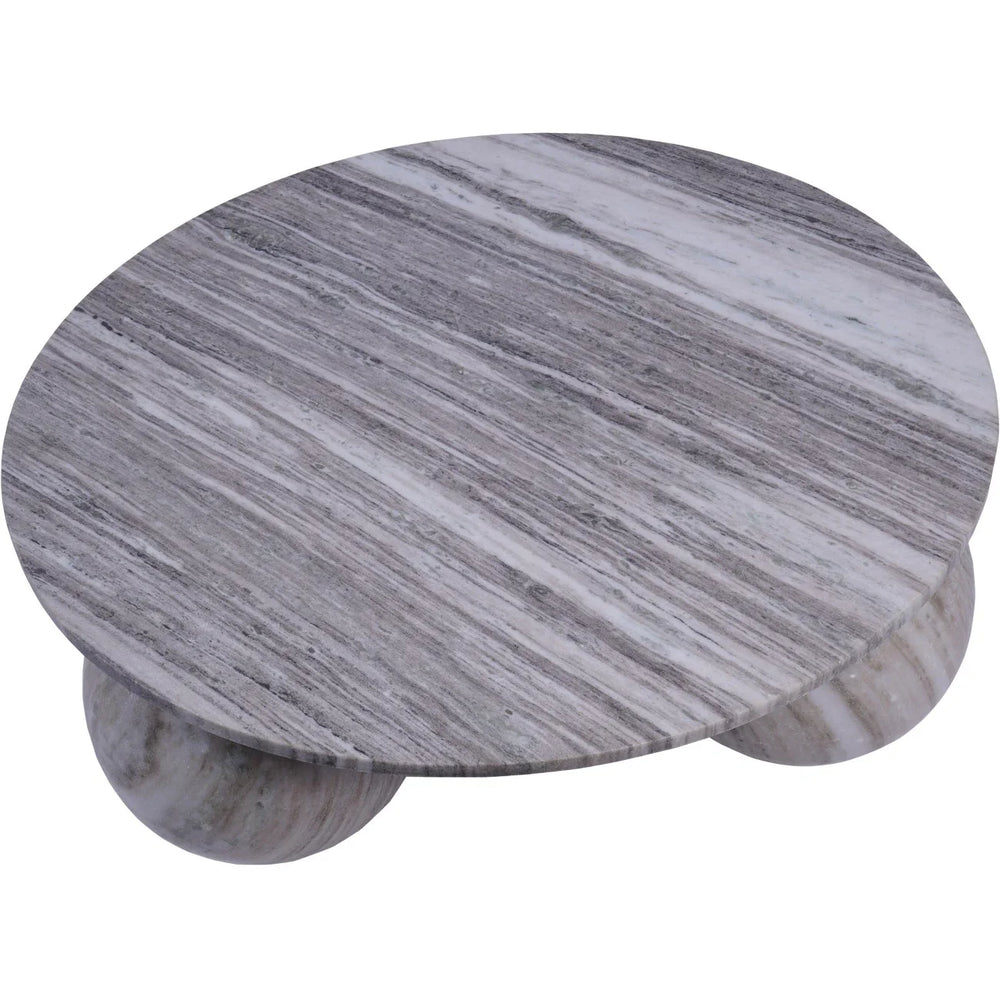 Round grey marble table with subtle veining on spherical legs