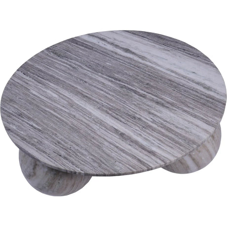 Round grey marble table with subtle veining on spherical legs