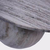 Grey marble coffee table edge with smooth, rounded base detail.