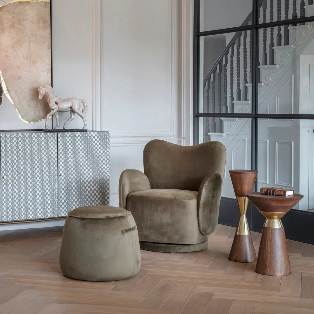 Wooden side table with gold accents in elegant living room setting.