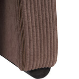 Mid brown corduroy chair detail with visible zipper and ribbed texture.