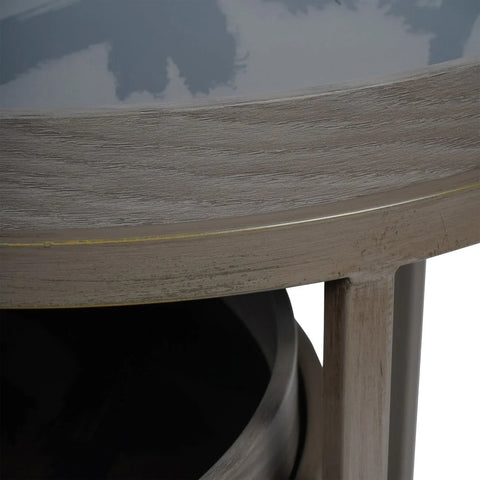 Taupe side table edge with textured wood grain detail.