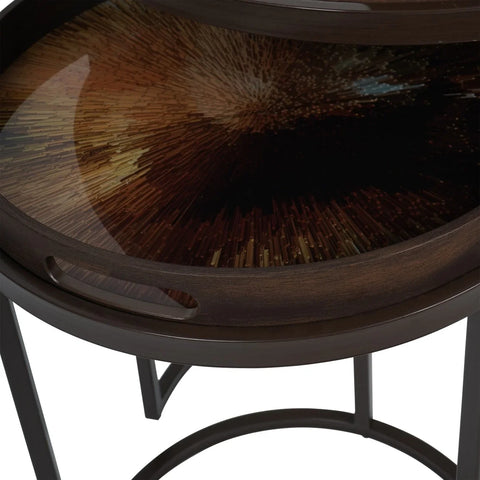 Dark brown tray table with a radiant burst pattern on the surface.