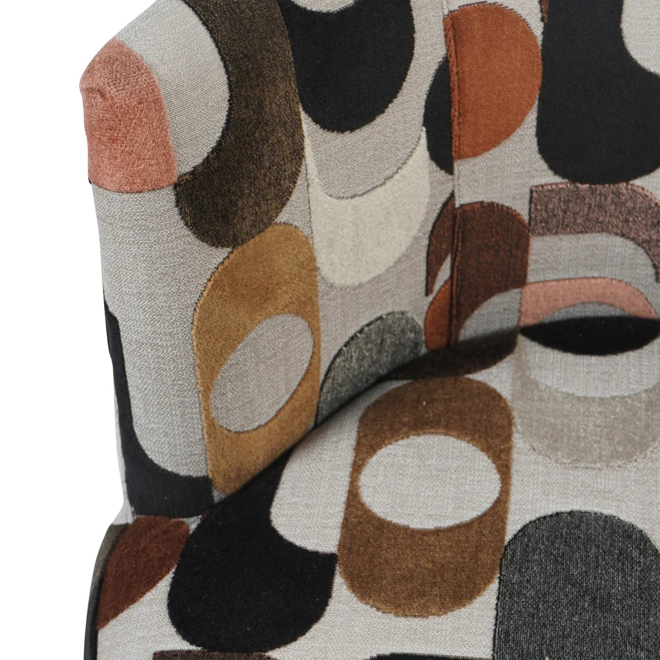 Multicolored velvet chair fabric with abstract circle pattern.