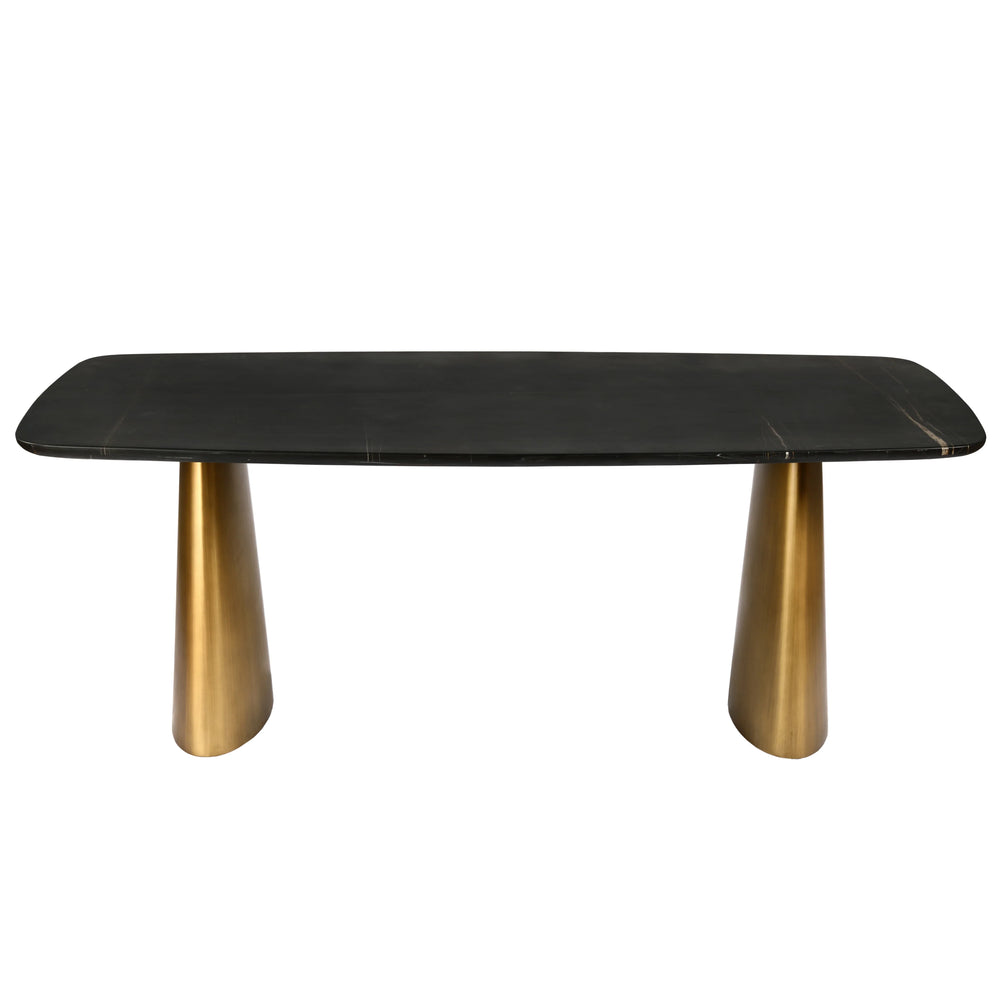 Black marble dining table with sleek brass legs.