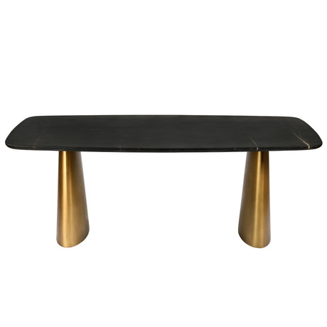 Black marble dining table with sleek brass legs.