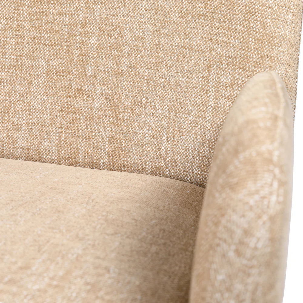 Wheat-colored chair fabric with textured weave detail.