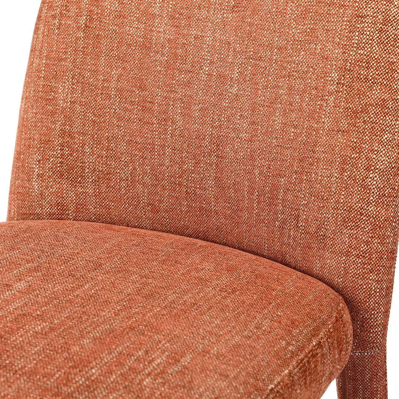 Rust-colored fabric dining chair with textured upholstery detail.