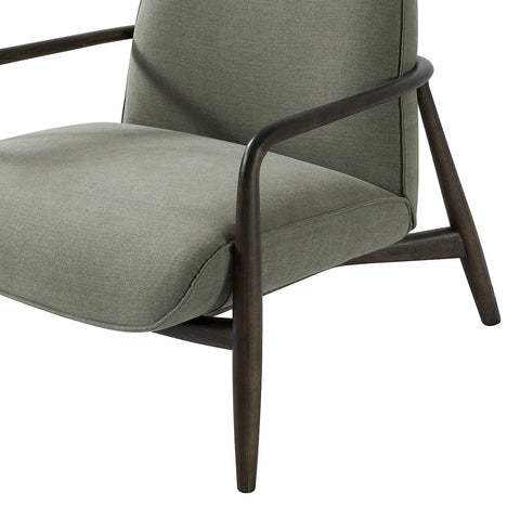 Green fabric chair with dark wooden arms and legs, angled view.
