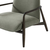 Green fabric chair with dark wooden arms and legs, angled view.