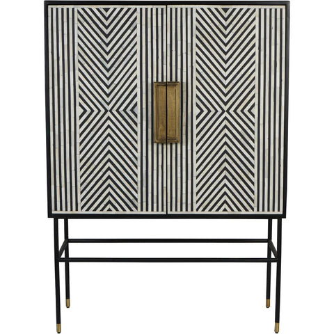 Black and white geometric inlay cabinet with brass handles and slender black legs.