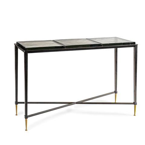 Black metal console table with glass top and gold-tipped legs.