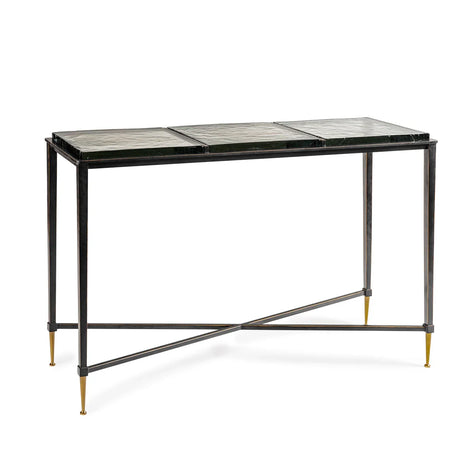 Black metal console table with glass top and gold-tipped legs.