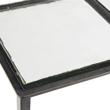Clear glass tabletop with black metal edge detail.