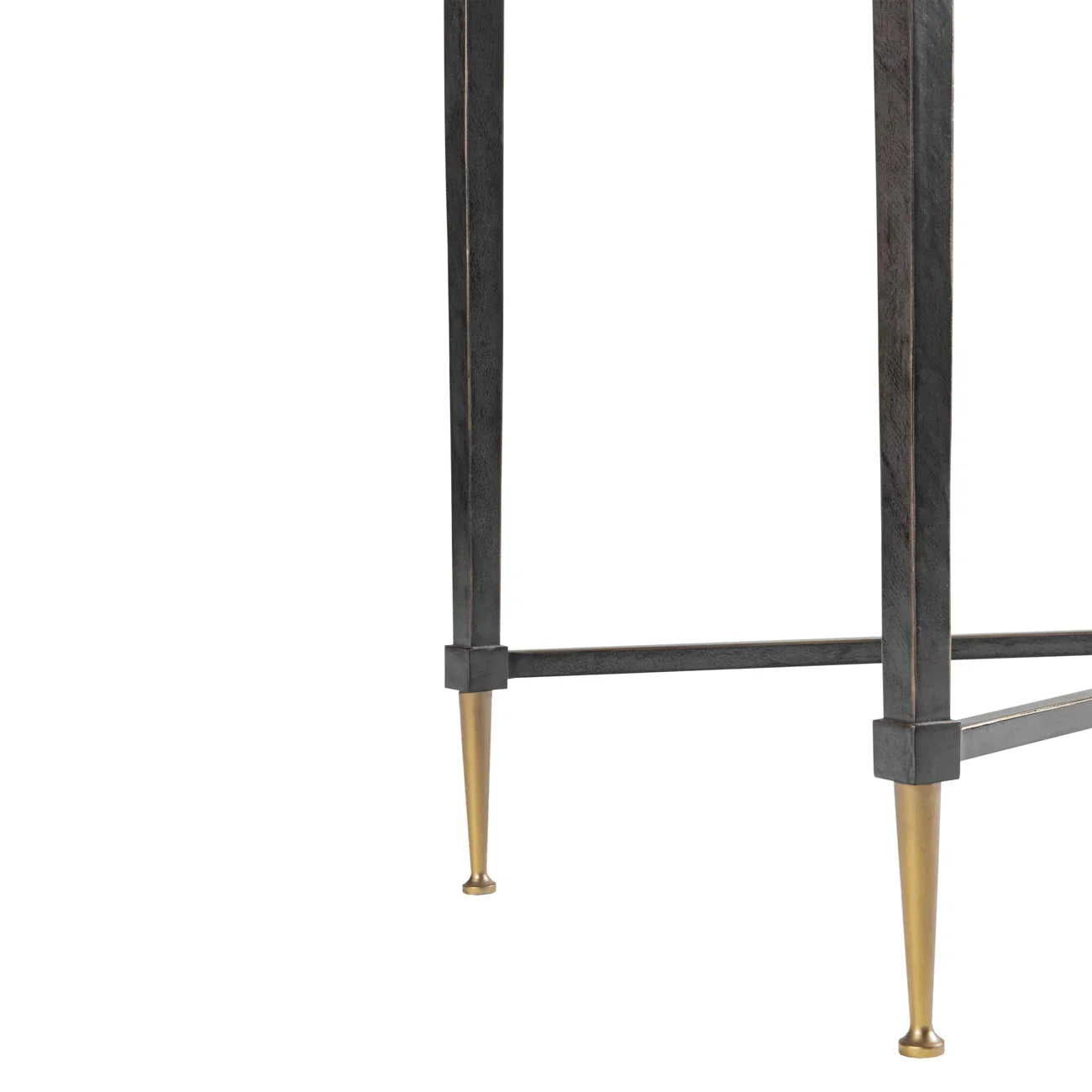 Black metal table legs with gold tapered feet detail.