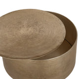Bronze metal drum table with removable lid revealing storage space.