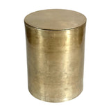 Gold cylindrical metal table with smooth finish.