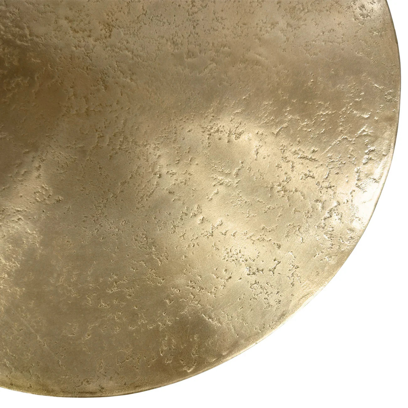 Gold metal table surface with textured finish detail.