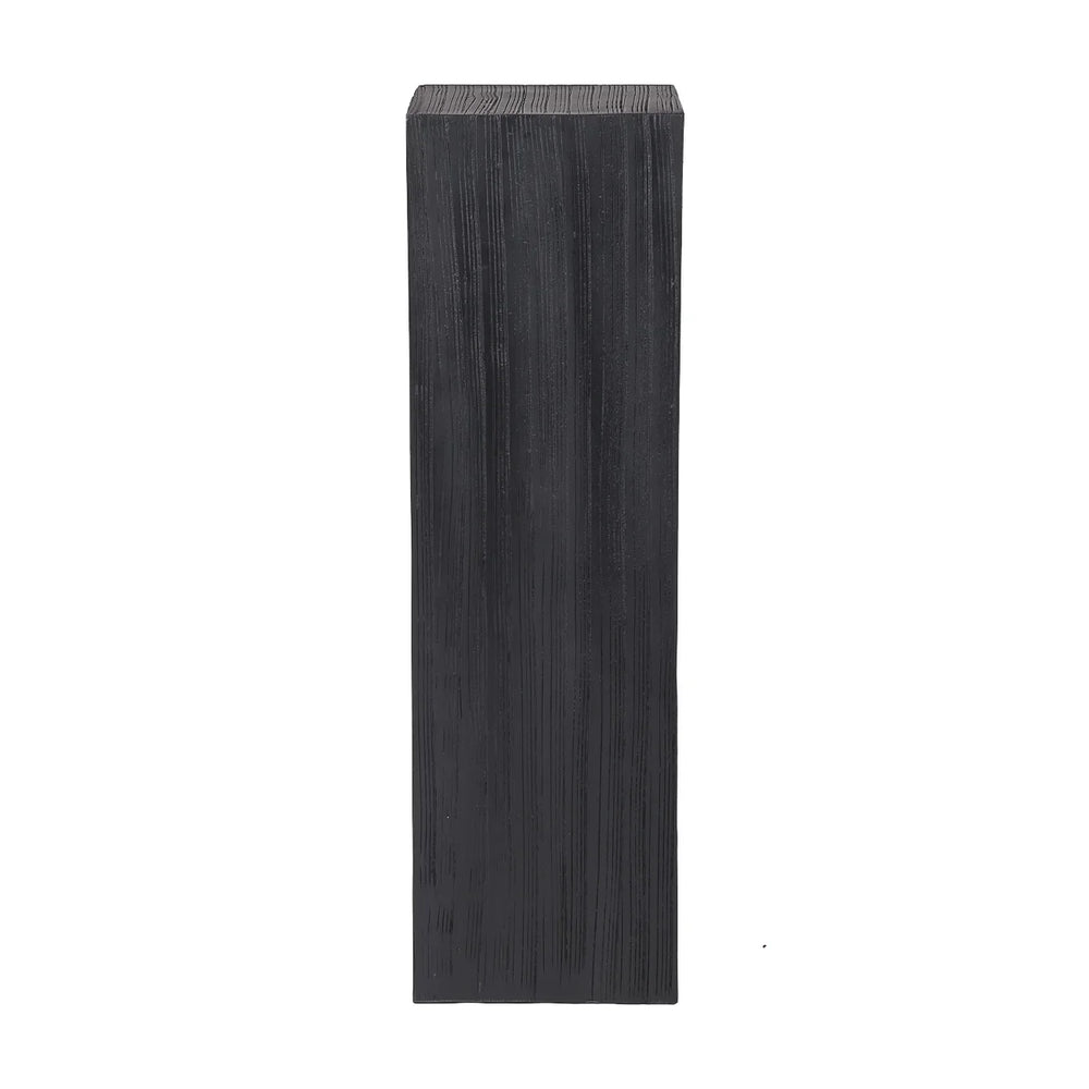 Dark wooden plinth with vertical grain texture.