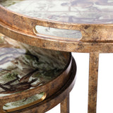 Bronze-finished tray tables with jungle-themed surface design.