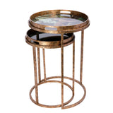 Bronze nesting tray tables with leopard design on top surface.