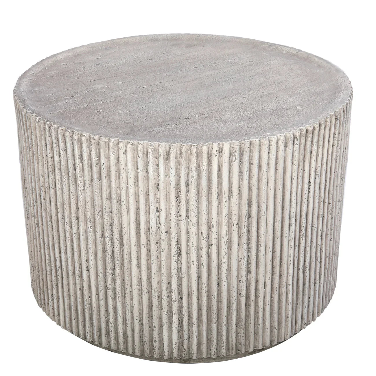 Round concrete table with ribbed texture and smooth top surface.