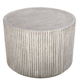 Round concrete table with ribbed texture and smooth top surface.