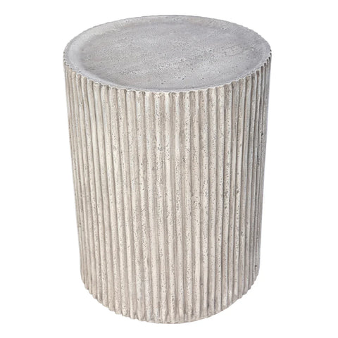 Textured grey cylindrical side table with vertical grooves.