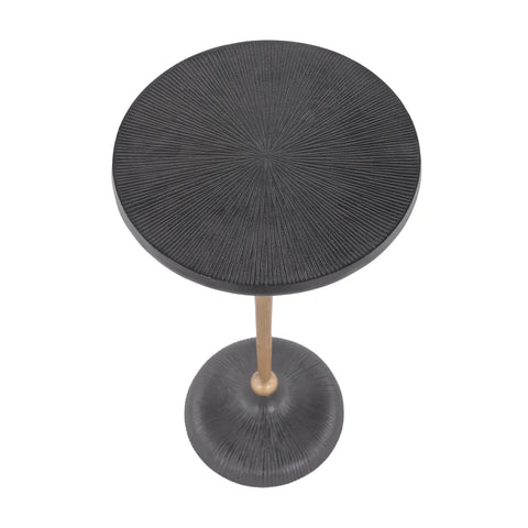Black round table with textured radial pattern and wooden stem.
