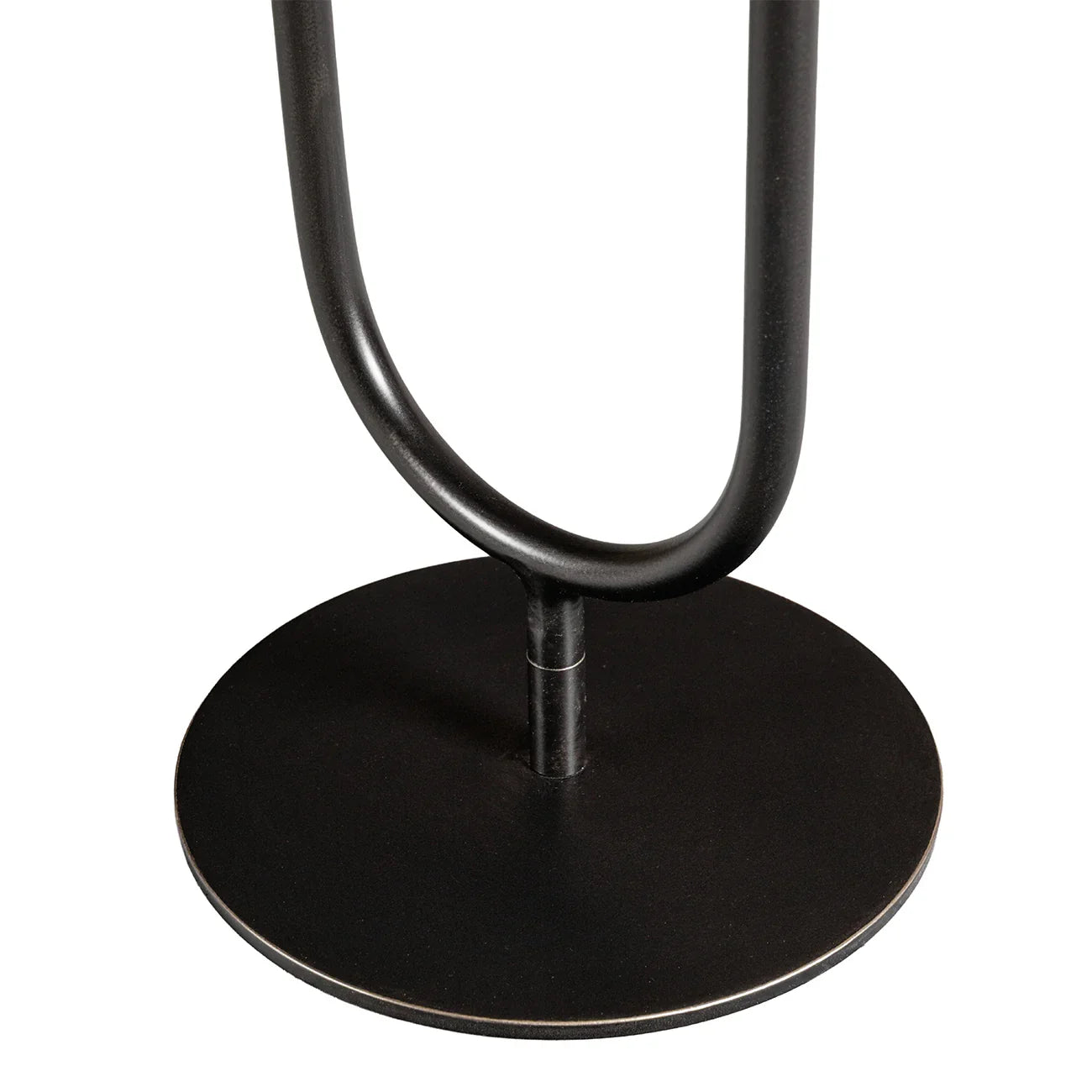 Black metal base with curved support detail.