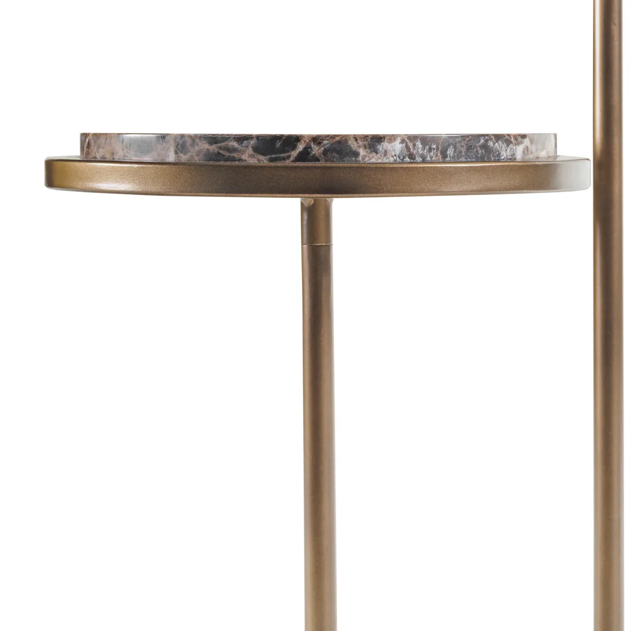 Bronze metal table with a dark marble top detail.