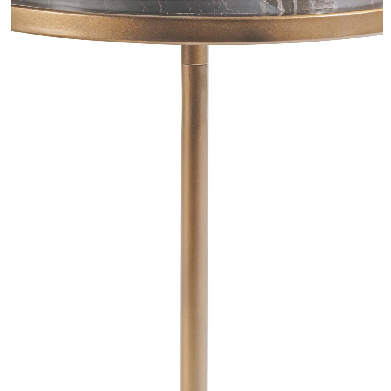 Gold metal table leg with marble top edge detail.