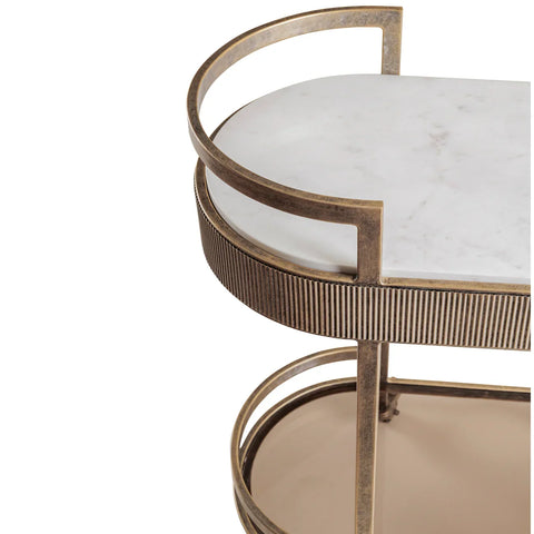 Aged gold drinks trolley with marble top and ribbed metal detailing.
