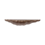 Antique brass floating shelf with scalloped edge design.