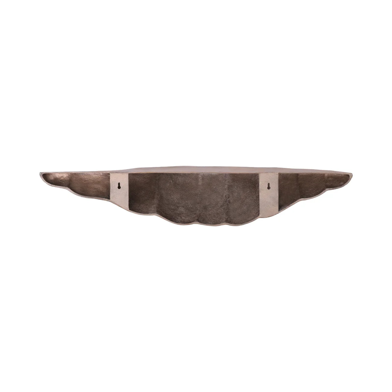 Antique brass shelf with scalloped edge design against white background.