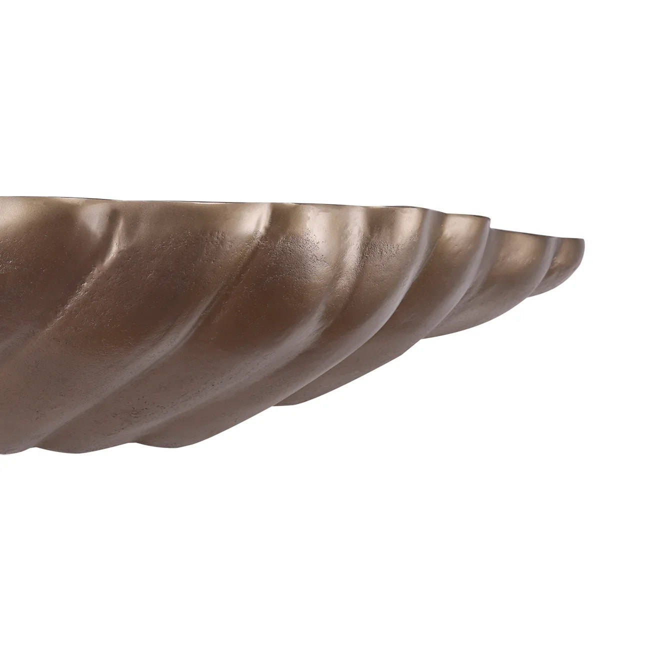 Antique brass shelf with a textured, wavy edge design.