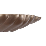 Antique brass shelf with a textured, wavy edge design.