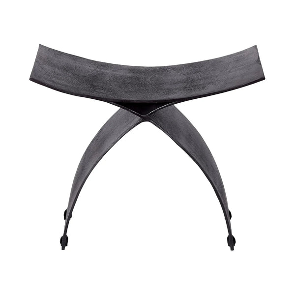 Black iron stool with crescent-shaped seat and curved legs | Home Centre Direct UK