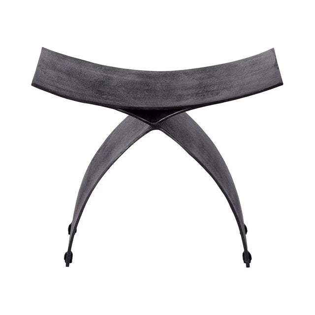 Black iron stool with crescent-shaped seat and curved legs | Home Centre Direct UK