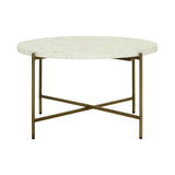 Round bone inlay table with brass legs and intricate surface pattern.
