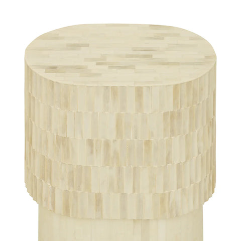 Cream bone inlay side table with layered geometric pattern.