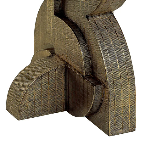 Bronze textured base of dining table with intricate detailing.