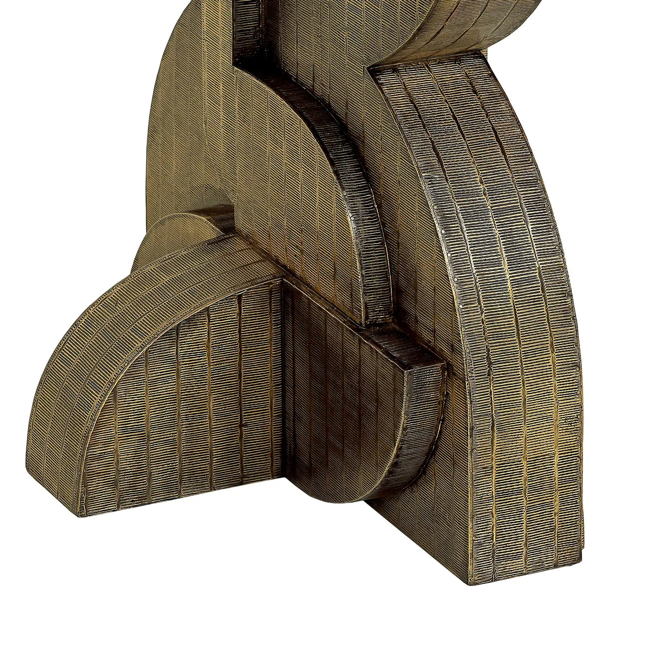 Bronze textured base of dining table with intricate detailing.