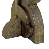 Bronze textured base of dining table with intricate detailing.
