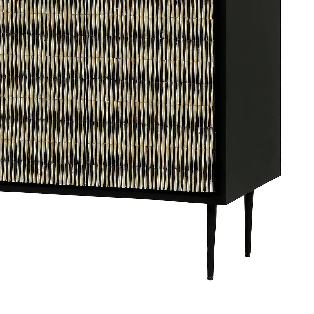 Black sideboard with intricate bone inlay pattern and sleek metal legs.