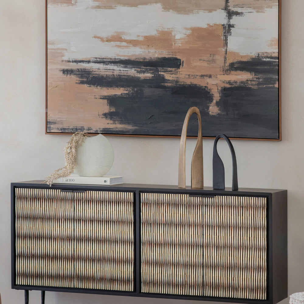 Striped bone inlay sideboard with decor in a modern living room setting.
