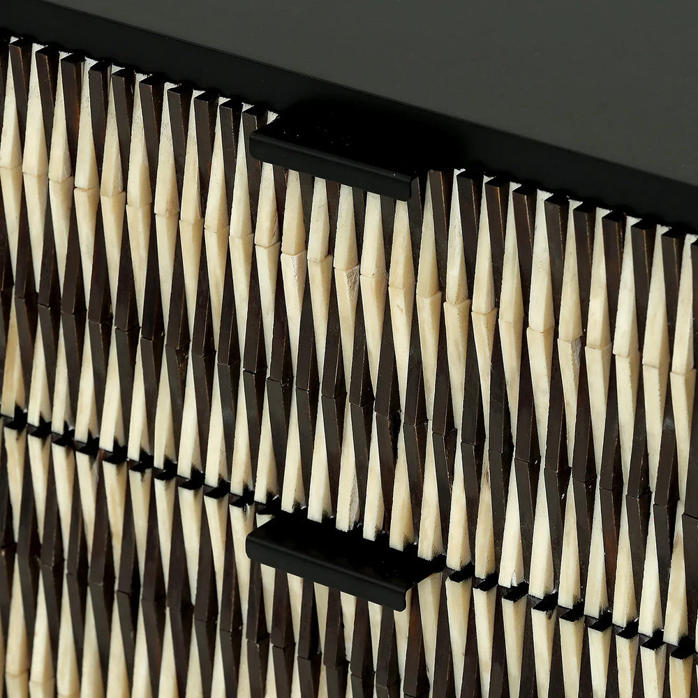 Black and ivory geometric pattern with sleek black handle detail.