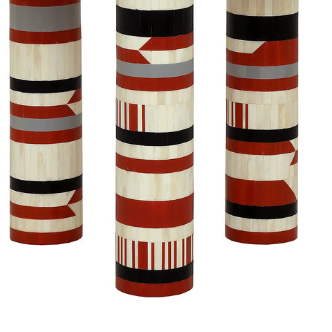 Red and black striped table legs with intricate bone inlay pattern.